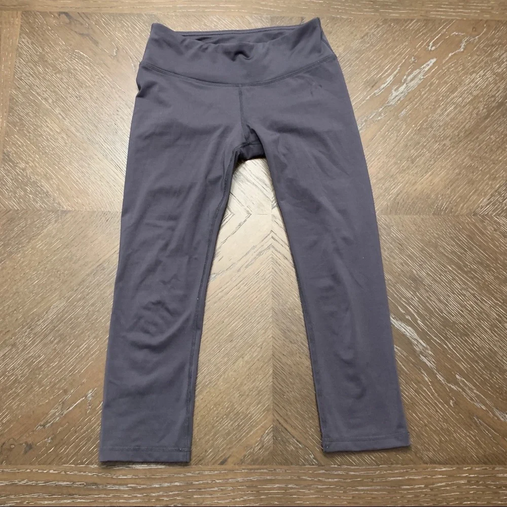 Head gray athletic pants turquoise on back legs Size XS